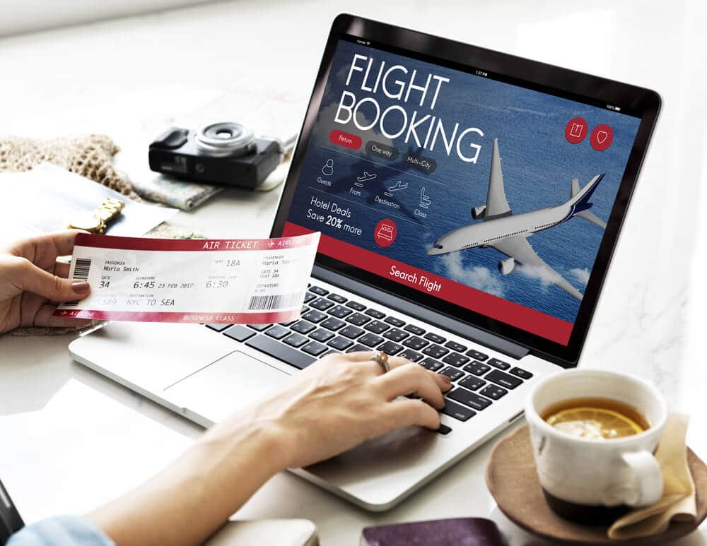 Booking a flight on a laptop
