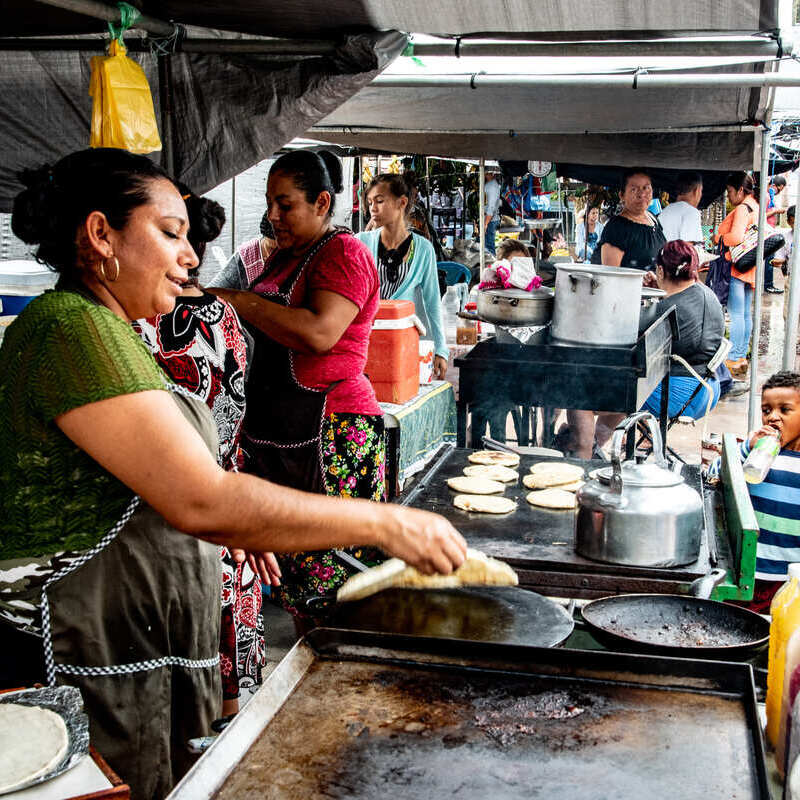 Woman cooking street food