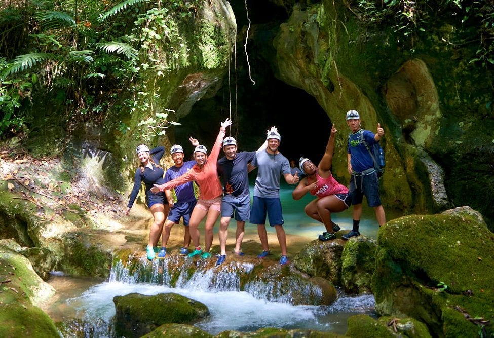 Tour group at Belize waterfall