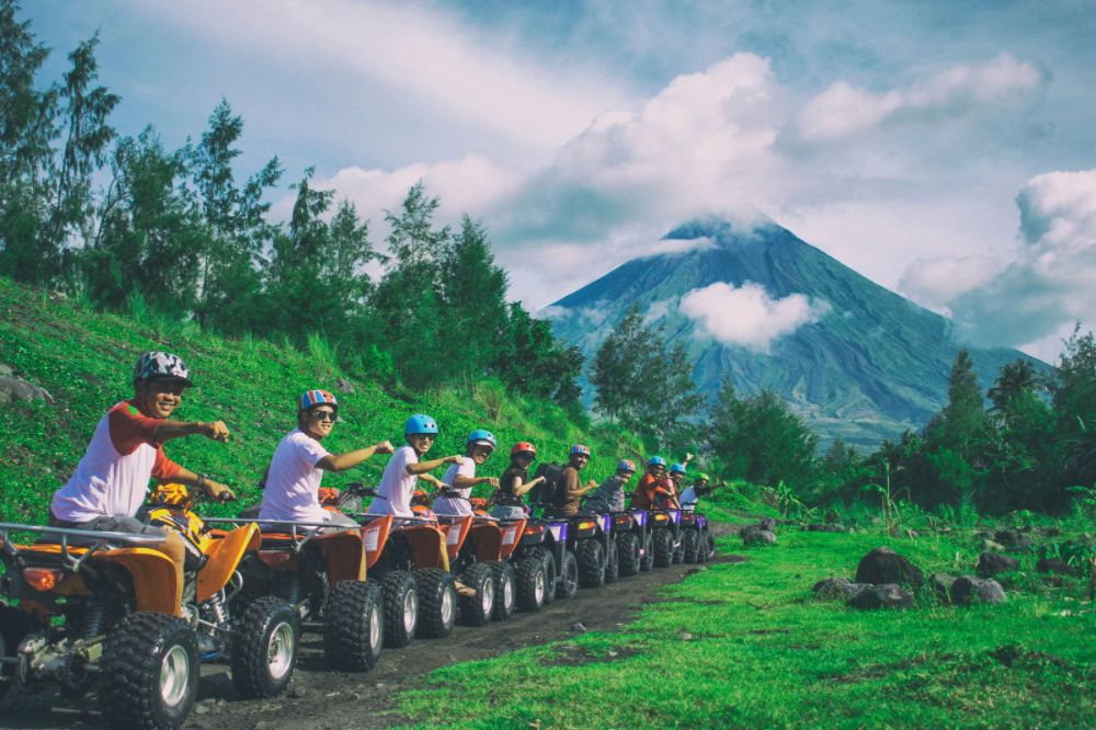 Tourists on ATVs in the Philippines