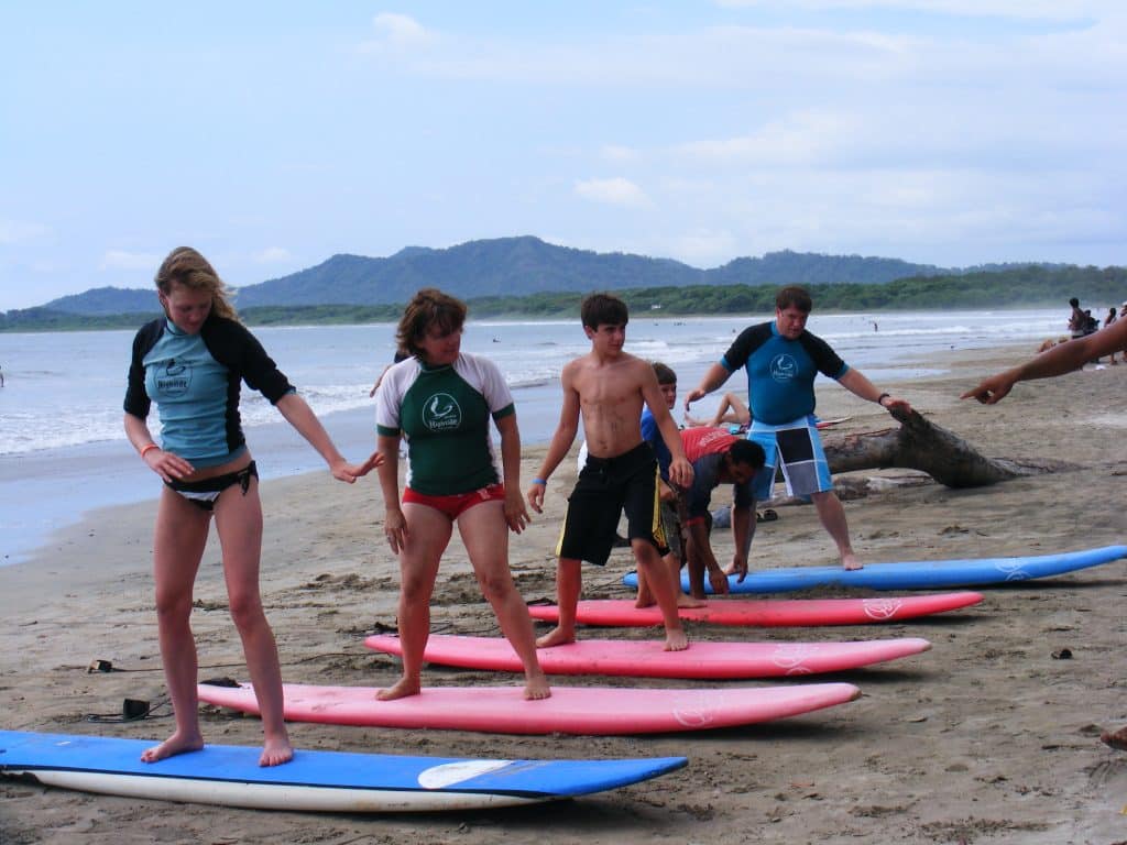 Kids learning to surf