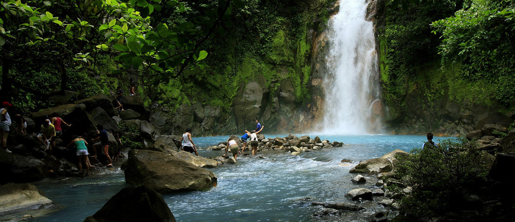 People at a waterfall