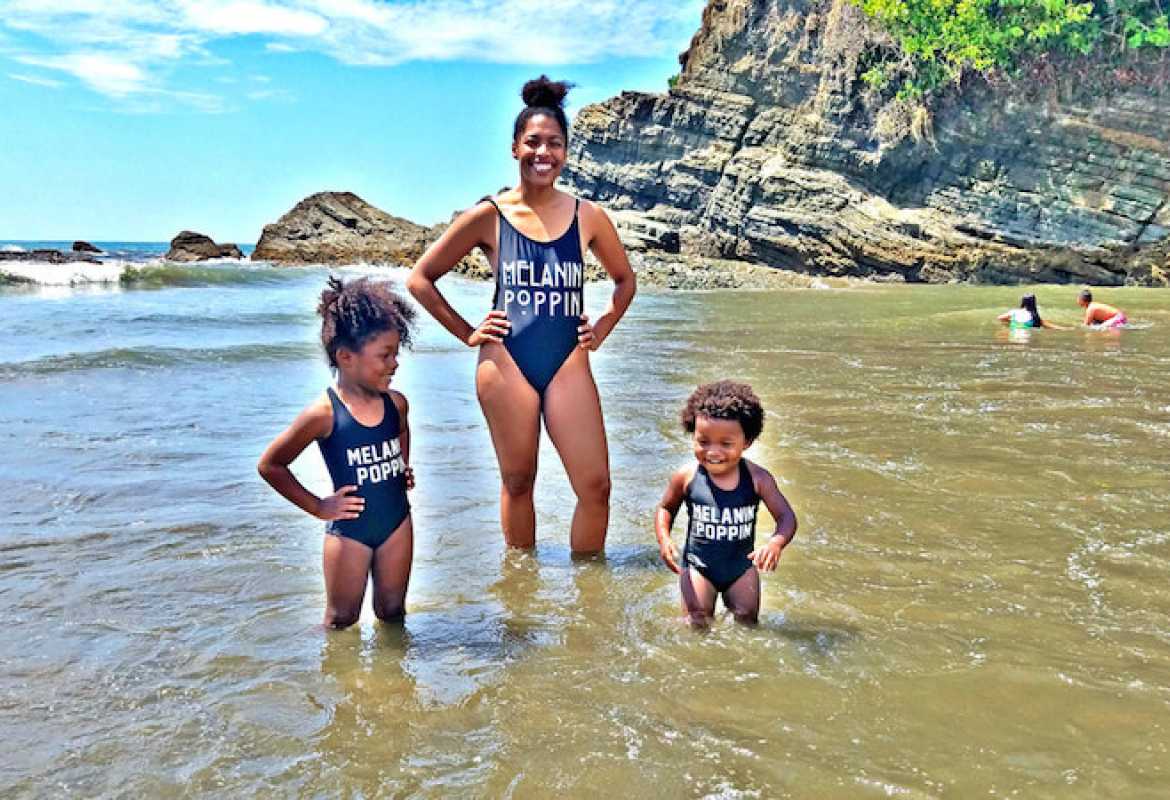 Mother and children on the beach