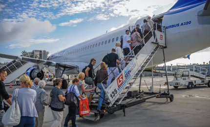 People boarding an airplane