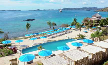 Resort pool with a view of the ocean