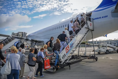 People boarding an airplane
